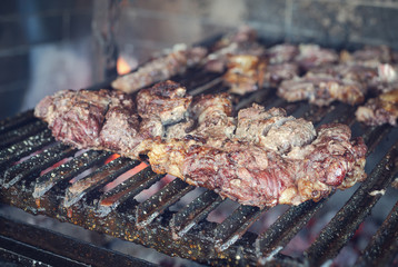 Patagonian lamb roasted on grill. Roasted leg of lamb. Argentine meat.