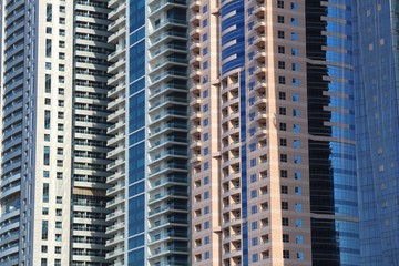 Fototapeta na wymiar Dubai residential skyscrapers - architecture of United Arab Emirates.