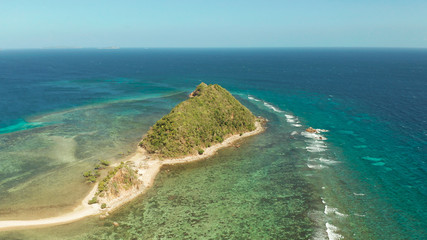 aerial view tropical island in blue lagoon, coral reef and big wave. Palawan, Philippines. tropical landscape ,travel concept