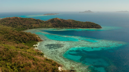 Fototapeta na wymiar aerial seascape tropical beach with white sand and clear blue sea. tropical landscape with islands and beaches. Philippines, Palawan.