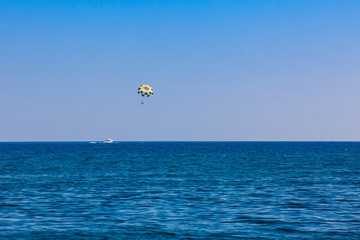 Parasailing in Perissa village beach at Santorini Island