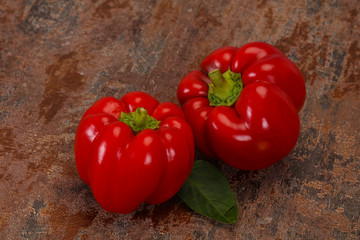 Ripe Red bell pepper over wooden