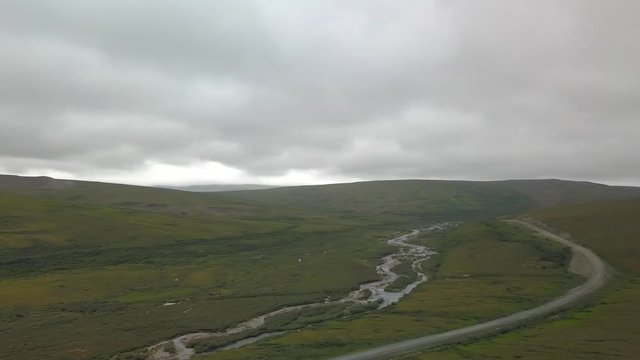 Aerial pan shot of the tundra and bush in Nome, Alaska