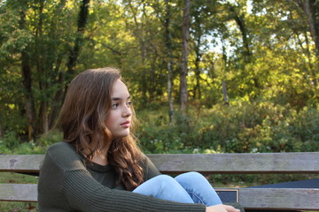 Obraz premium Girl on Bench