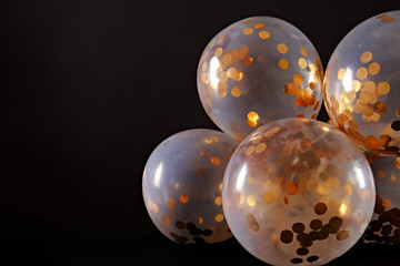 Bright festive carnival background with hats, streamers, confetti and balloons. Copy space