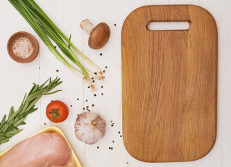 Food ingredients with cutting board