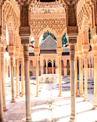 Courtyard of the Lions located inside the Nasrid monument of the Alhambra in the spanish city of...