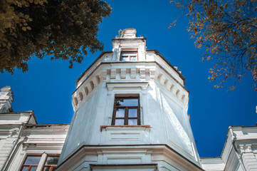 Bottom view on white tower of the estate Tereshchenko