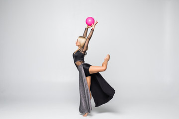 Gymnastics Professional athlete performs with ball isolated on white background
