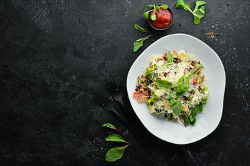 Caesar salad with bacon. Food. Top view. Free space for your text.