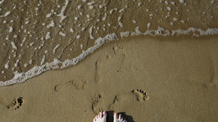 footprints in sand and food