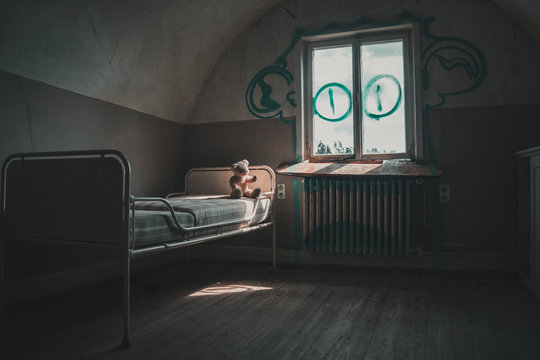 Teddy Bear On A Bed In Abandoned Hospital