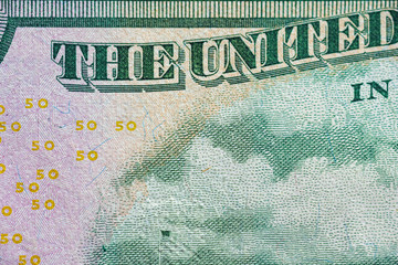 Fragment of a banknote of fifty american dollars.