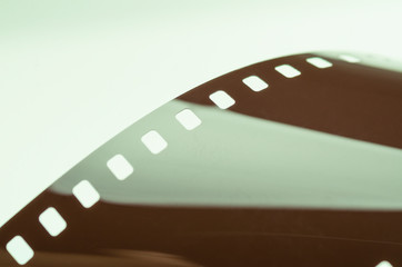 Strip of glossy film abstract close-up, soft focus