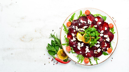 Beet vegetable salad with feta cheese. Food. Top view. Free space for your text.