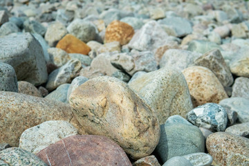 Stones in different sizes, forms and colors. Summertime in Sweden.