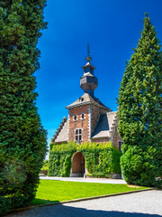 Summer sunny view of the Jehay Castle or Jehay-Bodegnee Castle gate tower, Province of Liege, Belgium