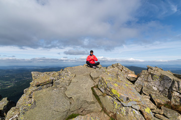 girl athlete on top of the mountain.