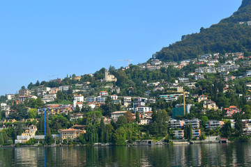 Fototapeta na wymiar Panoramic view of the lake and the city of Lugano, Switzerland, Europe.