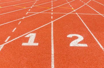1 2 number, start or finish position  on race track in football stadium.