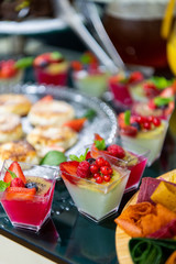 Sweet milk and berry desserts at breakfast buffet in a hotel