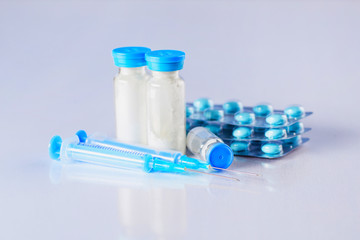 Drug prescription for treatment medication. Pharmaceutical medicament, cure in container for health. Pharmacy theme, capsule pills with medicine antibiotic in packages.