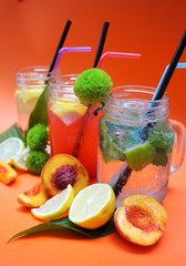 cocktail with lime, peach and mint