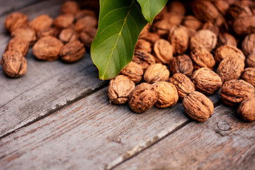 Walnuts close-up on a wooden background.