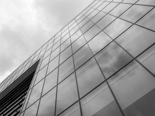 Fototapeta na wymiar office building reflections on black and white