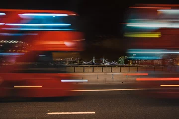 Foto op Aluminium London bridge with London red Buses motion  © MelaniePhotos