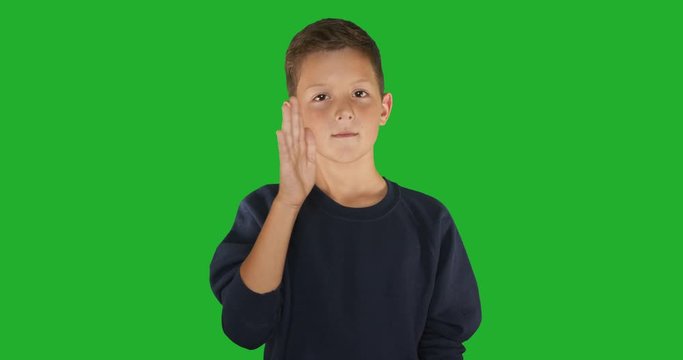 Deaf boy signing I know sign language, communication for hearing impaired. Green screen