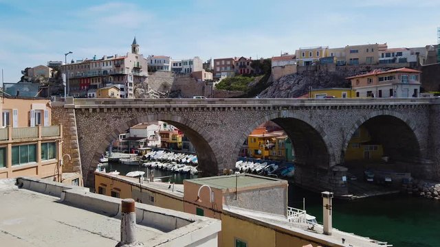 Marseille city, France. Panoramic view on on old bridge and harbor. UHD 4K cinematic stock footage about French Riviera, Mediterranean Coast, South European life, travel, culture.