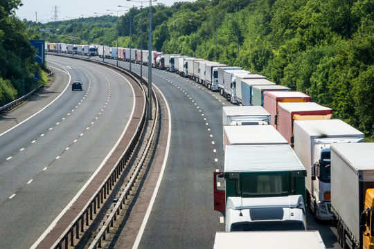 A Line of Lorries Parked on the M20 Motorway in Operation Stack