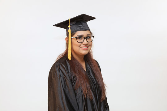 Portrait of a young hispanic female graduate