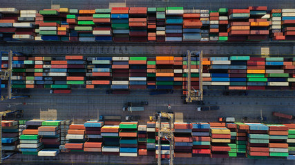 Aerial top down photo of containers in ship port for business Logistics and transportation of...