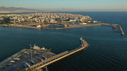 Aerial drone photo of iconic and busy port of Piraeus at sunset, Attica, Greece