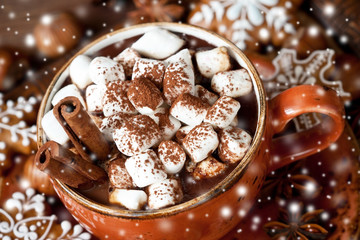 Cup of creamy hot chocolate with melted marshmallows
