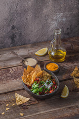 Traditional Arabic fattoush salad with fried flat bread, copy space - 292235066