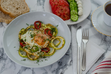 Healthy breakfast on marble table.