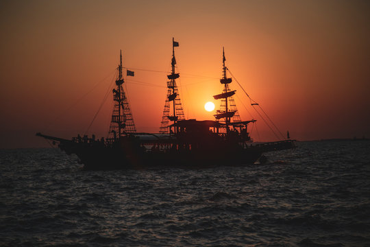 An old Greek galleon view from the Aegean sea during sunset © Solidasrock