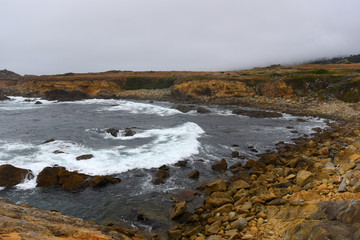 waves crashing on rocks