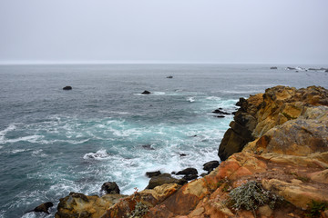 waves crashing on rocks