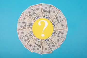 Question mark on kaleidoscope from money.