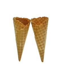 Empty waffle Cup for ice cream isolated on white background. Waffle cone on white background. Empty sugar waffle cones. 