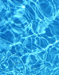 Surface of blue swimming pool,background of water in swimming pool. Water background blue.