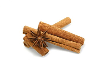 Cinnamon sticks and anise star isolated on white background close up. Spice Cinnamon sticks and anise star.