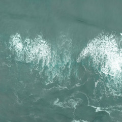 Abstract texture of water with waves. Top view of turquoise water as a background, Ocean, sea, lake. Square for instagram