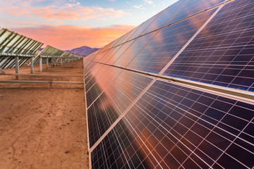 Hundreds solar energy  panels rows along the dry lands at Atacama Desert, Chile. Huge Photovoltaic...