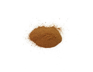 Spice cinnamon powder isolated on a white background. Cinnamon powder spilled on a white surface.