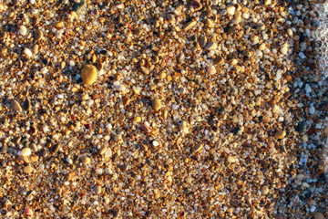 sea pebbles colored granite on the beach